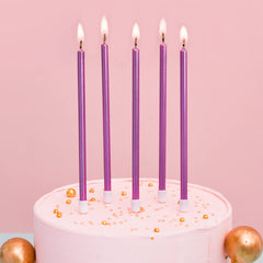 PHD CAKE purple tapered candles close-up showcase sleek metallic shine for classy decor.