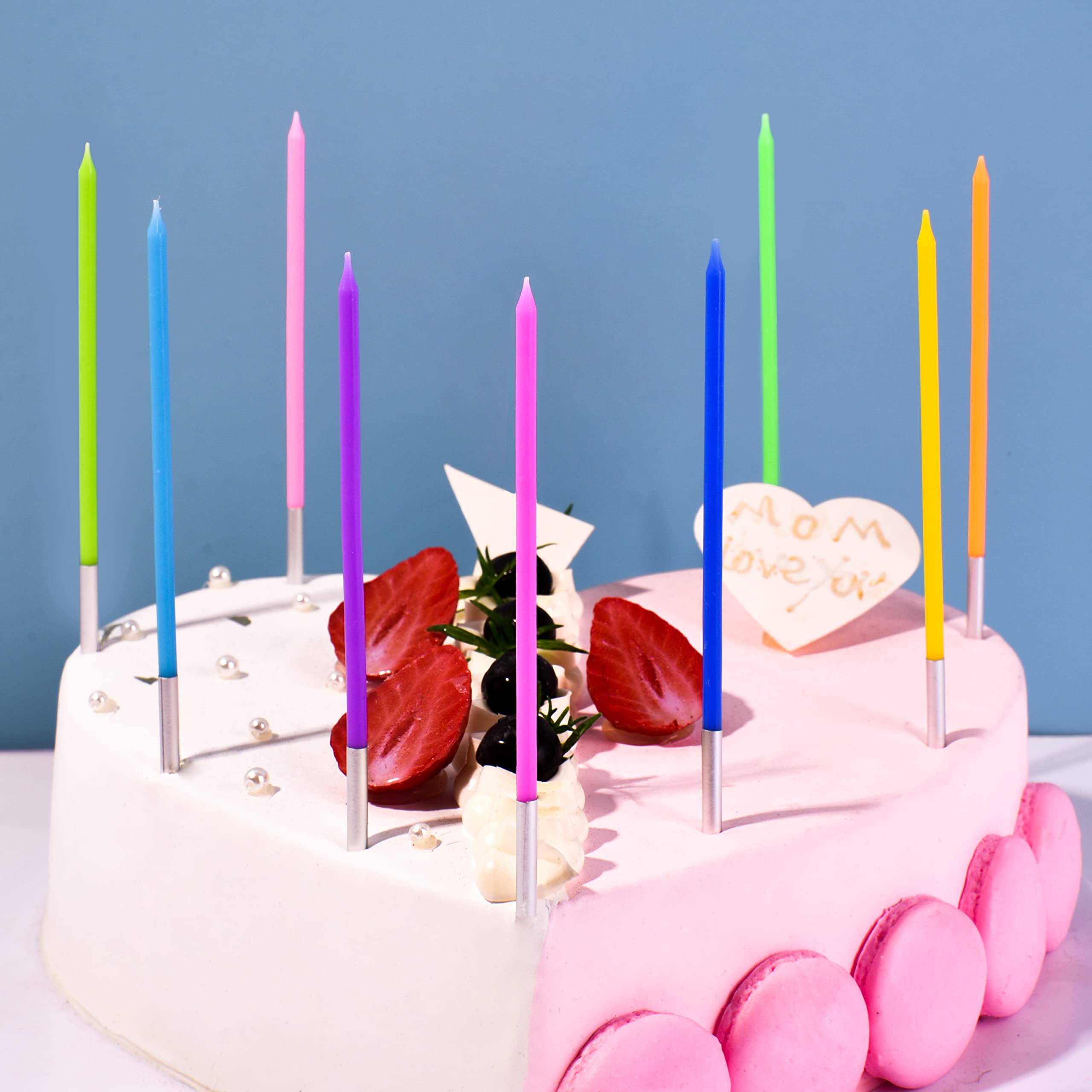 PHD CAKE rainbow long thin candles on cake showcase color and height for photos.