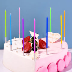 PHD CAKE rainbow long thin candles on cake showcase color and height for photos.