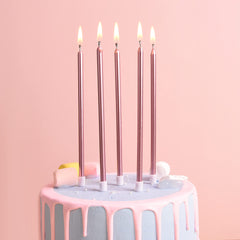 PHD CAKE rose-gold long-thin candle on cake enhances birthday table with premium sparkle.