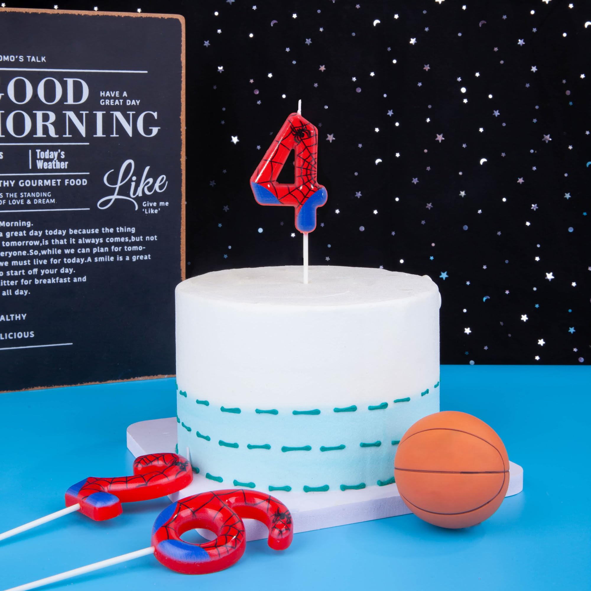 PHD CAKE spider-themed cake decor adds playful party vibe.