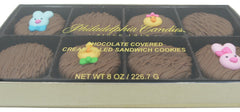 Philadelphia Candies OREO cookies with chick faces for festive snacking.