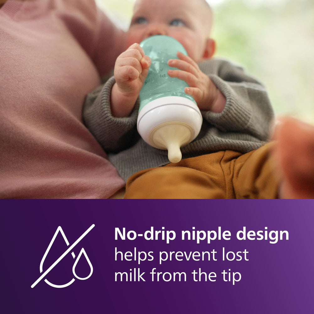 Ergonomic teal Philips Avent bottle designed for comfortable parent hand grip