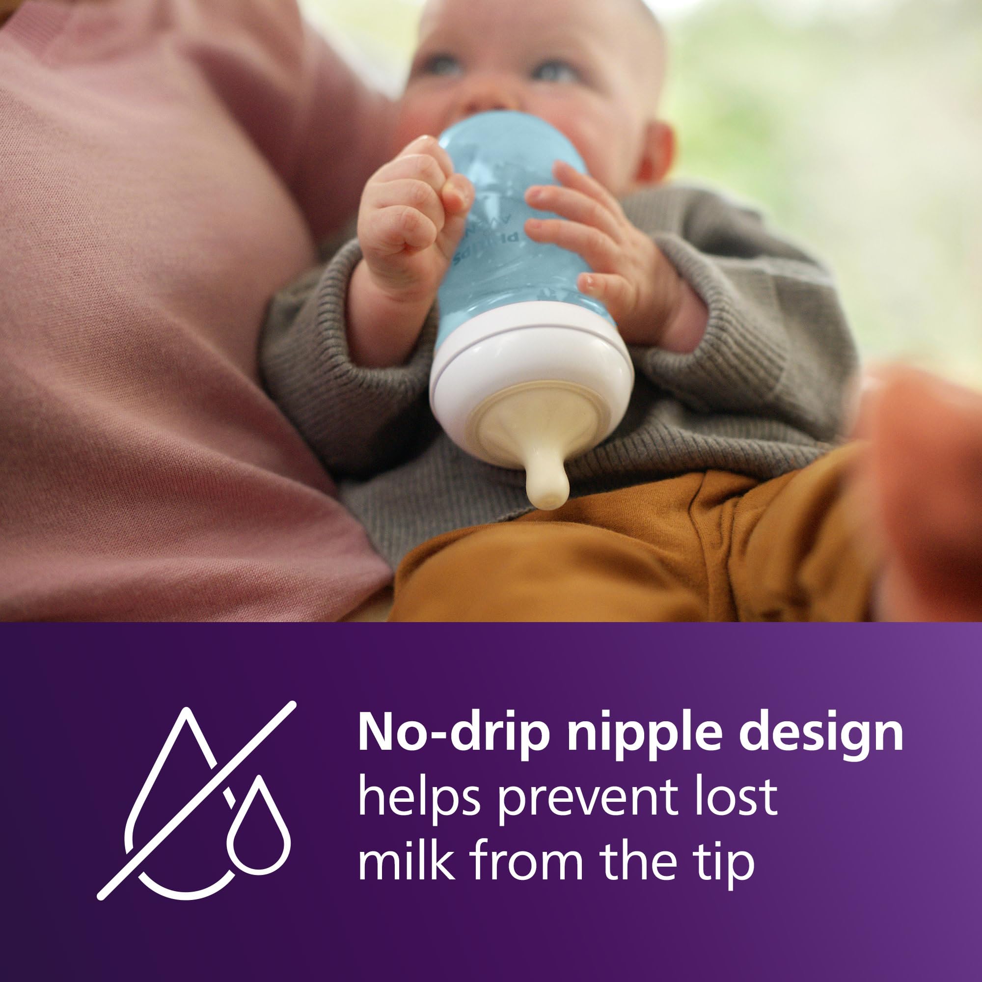 Ergonomic bottle shape for comfortable holding by parents