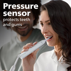 Philips Sonicare 4100 timer and QuadPacer guiding a two-minute routine.