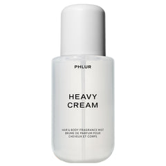 PHLUR Heavy Cream Body Mist bottle ready for a light daily vanilla fragrance.