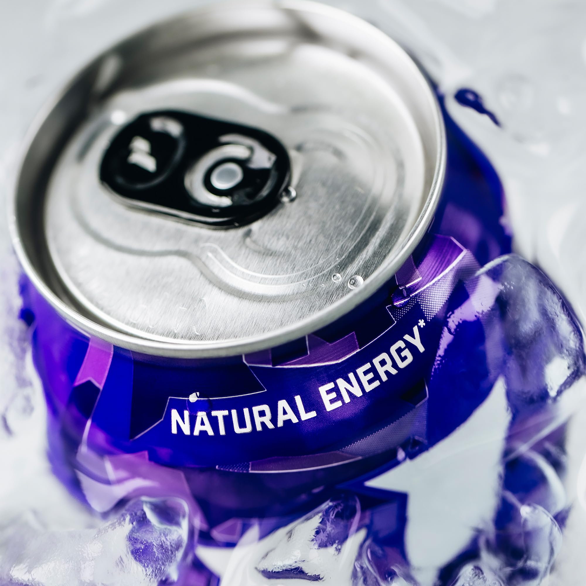 Phorm Energy Grape Smash being poured into a glass showing crisp fizz