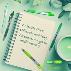 PILOT G2 Boost Greens notebook writing in use demonstrates ergonomic grip.