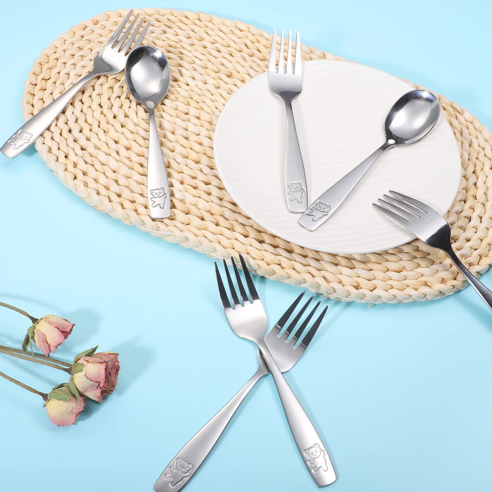 Pimoys bear-engraved spoons add fun to mealtime.