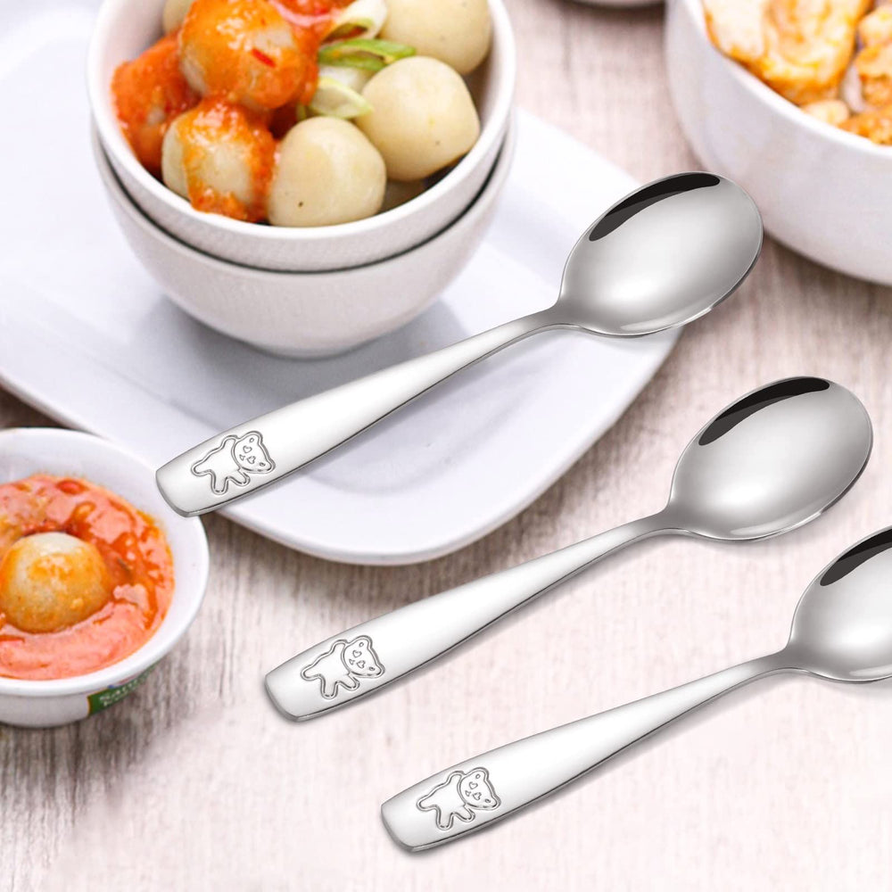 Pimoys small-hands spoon design supports self-feeding confidence.
