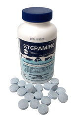 Pink Rhyme Steramine tablets being dispensed, highlighting economical solution for large workplaces