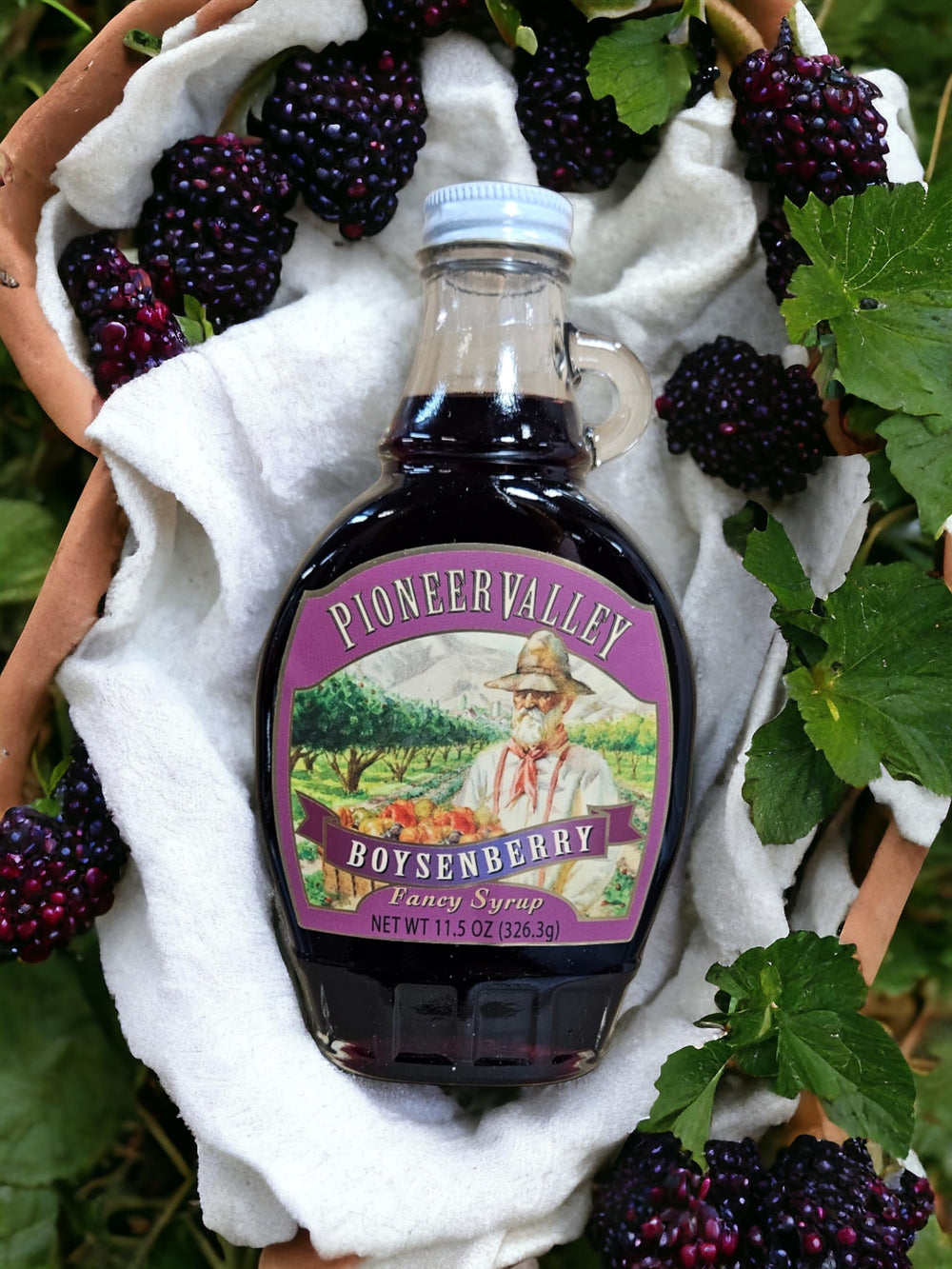 Heritage-inspired Pioneer Valley Syrup bottle reflects handcrafted family tradition.