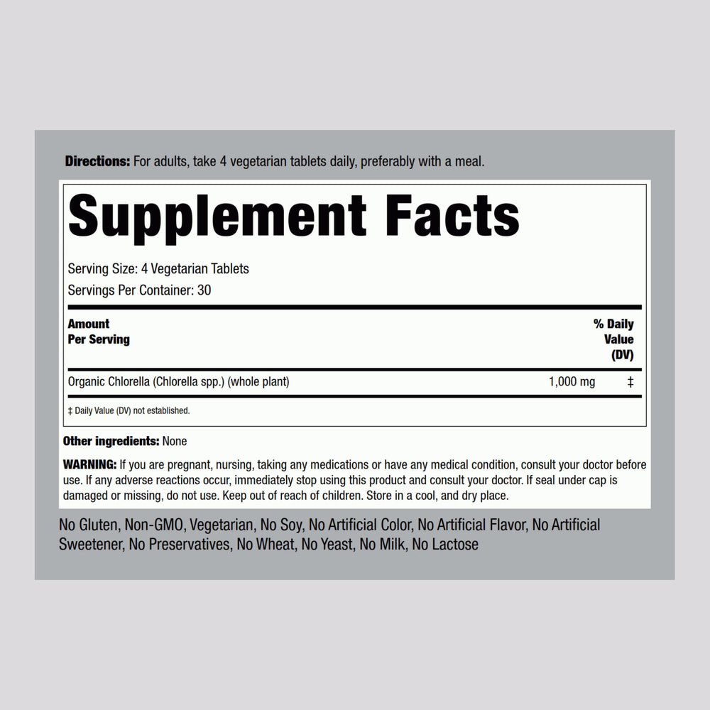 Piping Rock Chlorella tablets close-up, compact daily capsules for easy use.