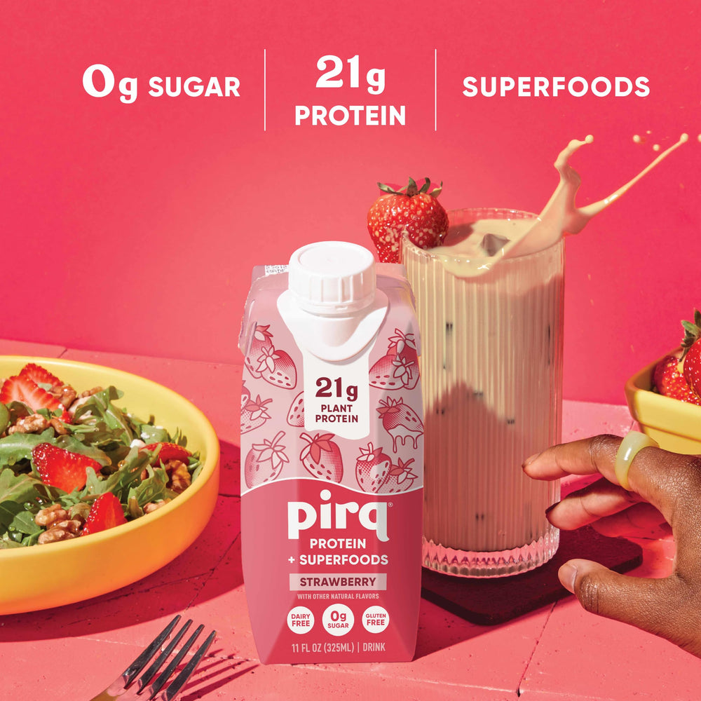 Pirq plant-based protein shake scoop in glass, highlights 21g protein and texture.
