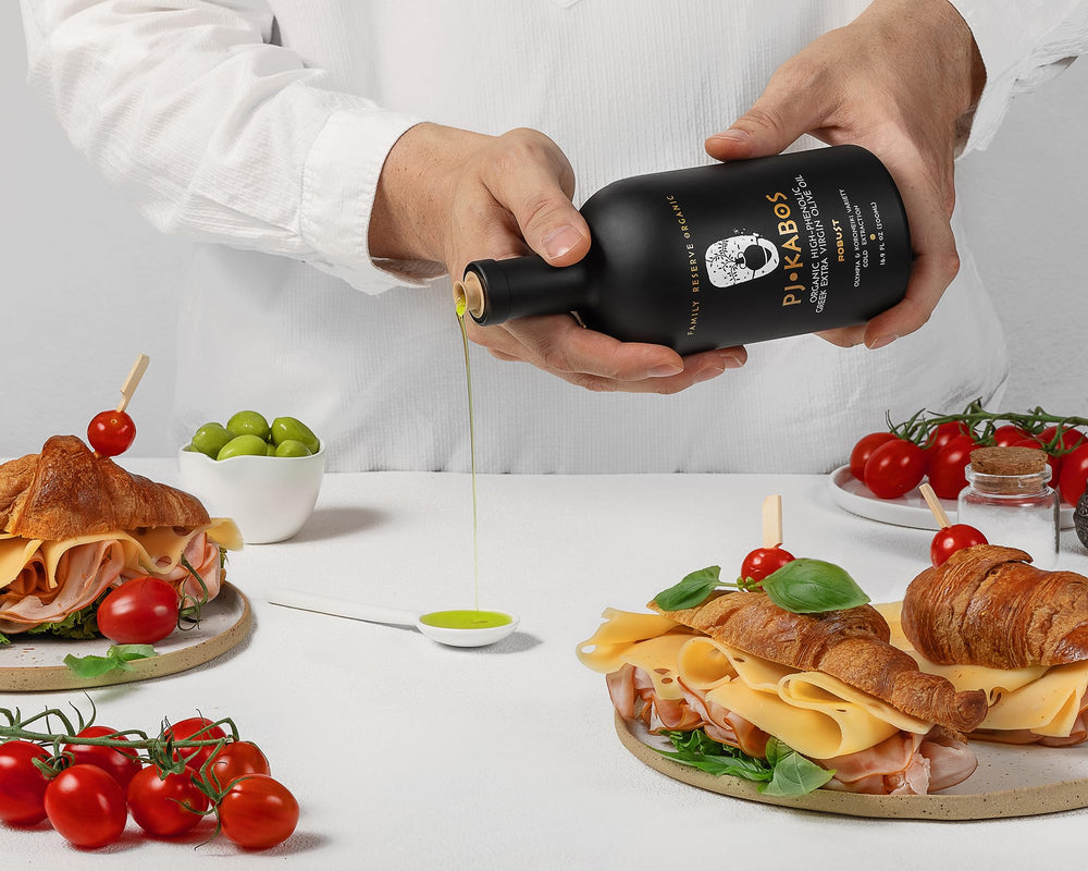 P.J. KABOS kosher seal on bottle, signaling trusted quality.