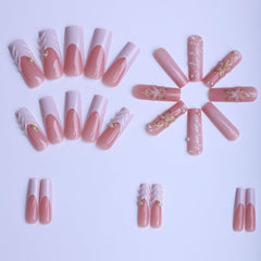 plalely close-up of pearl charms design on nails