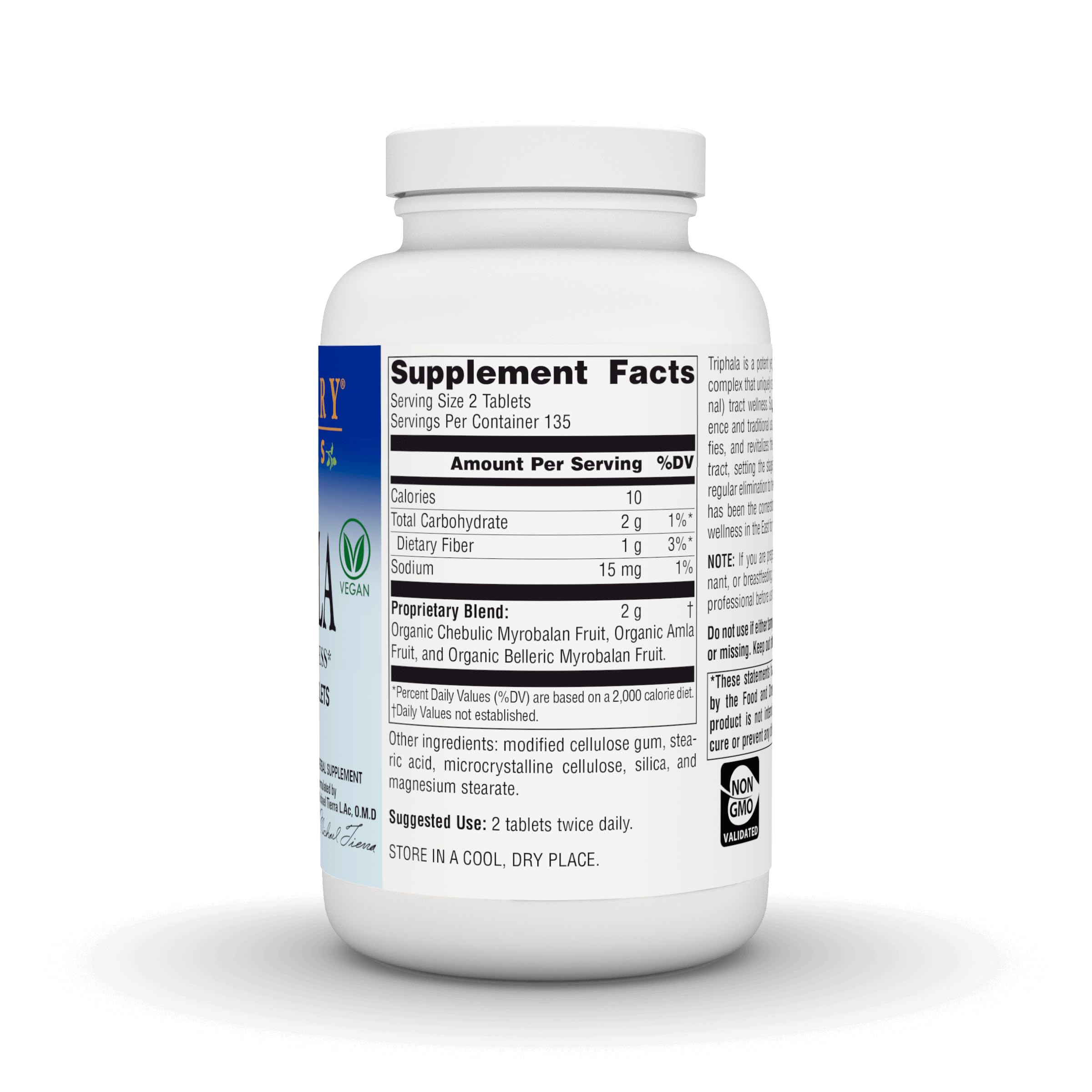 Planetary Herbals Triphala tablets close-up emphasizing dose and form.