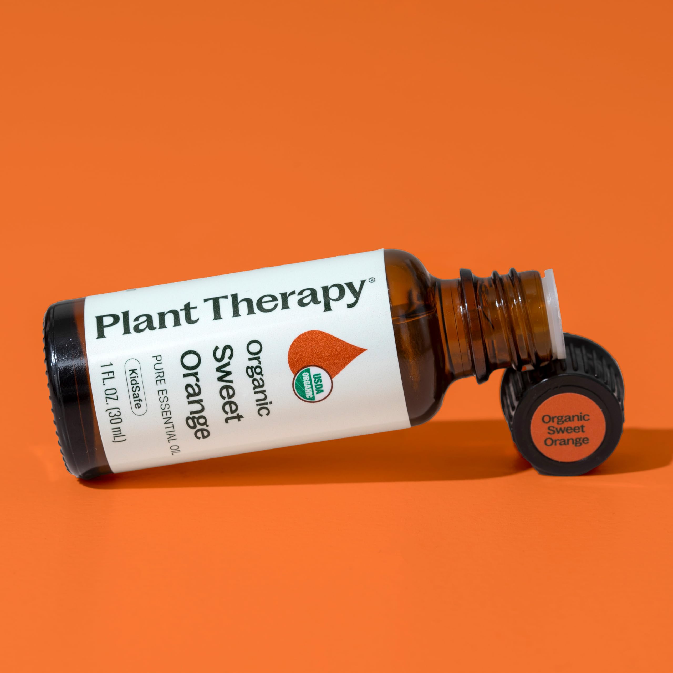 Plant Therapy Sweet Orange bath scrub mixer suggests spa-like self-care ideas.