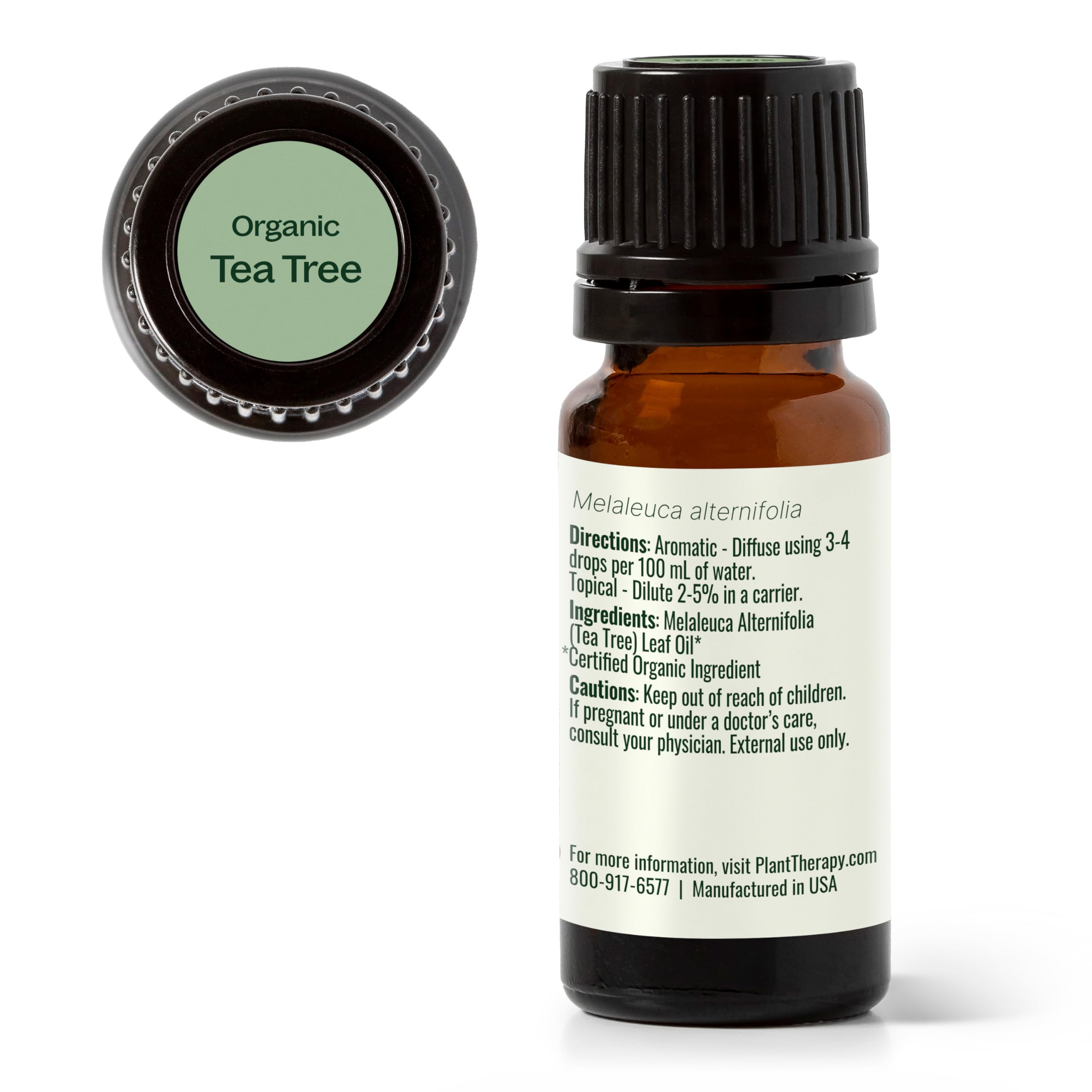 Plant Therapy Tea Tree Oil near cleaning supplies for deep-cleaning and air freshening.