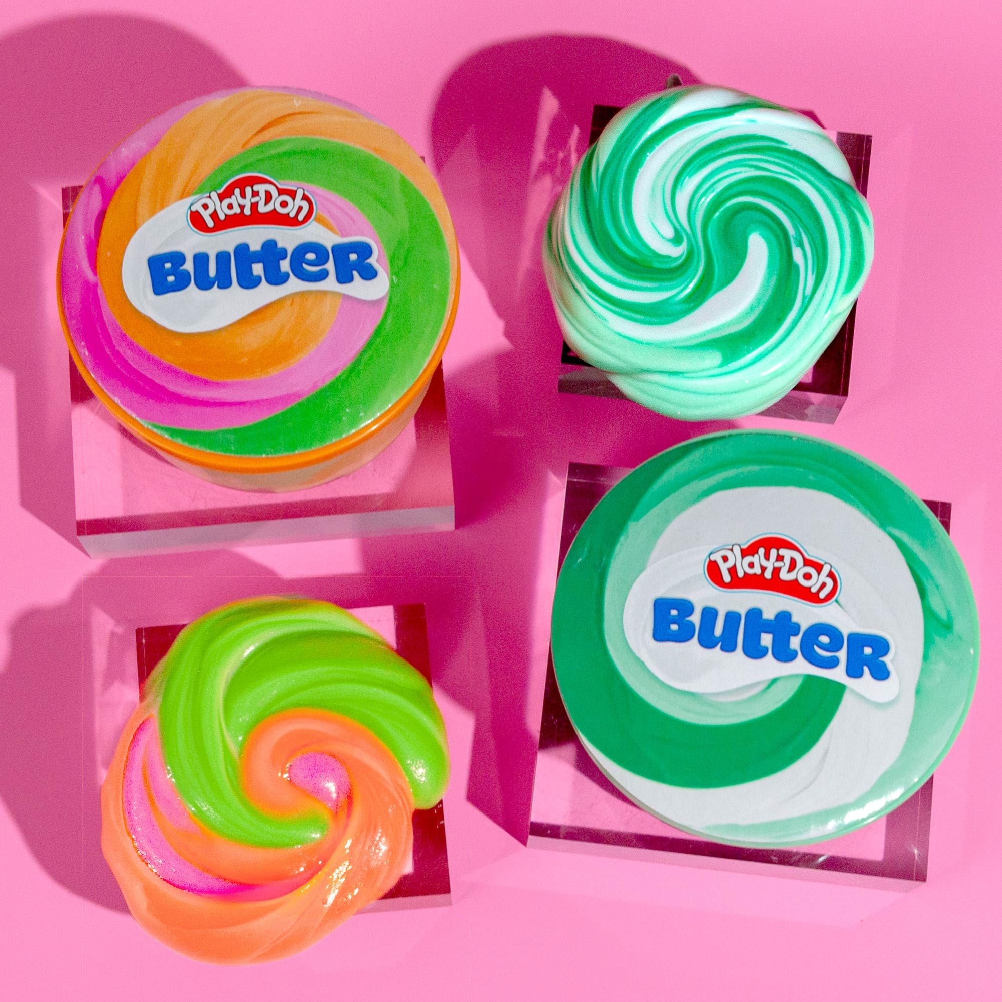Play-Doh Scented Butter Slime party-favor display offers portable fun for gatherings.