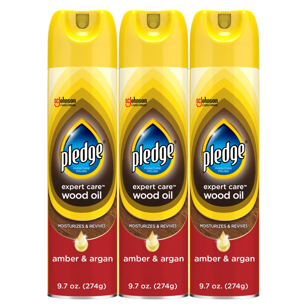Pledge Expert Care Wood Oil spray bottle revives wood with amber-argan scent.
