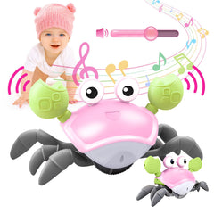 Plnmlls Crawling Crab Toy pink with music and LED lights for engaging tummy time.