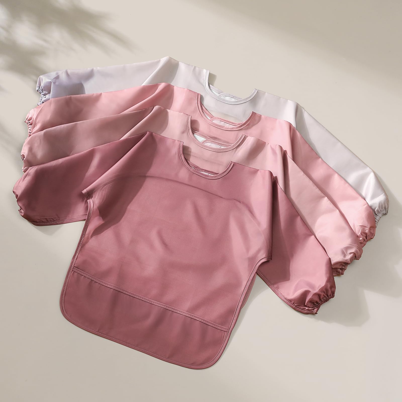 POIKSHARK travel-friendly bib rolls up compactly for on-the-go feeding.