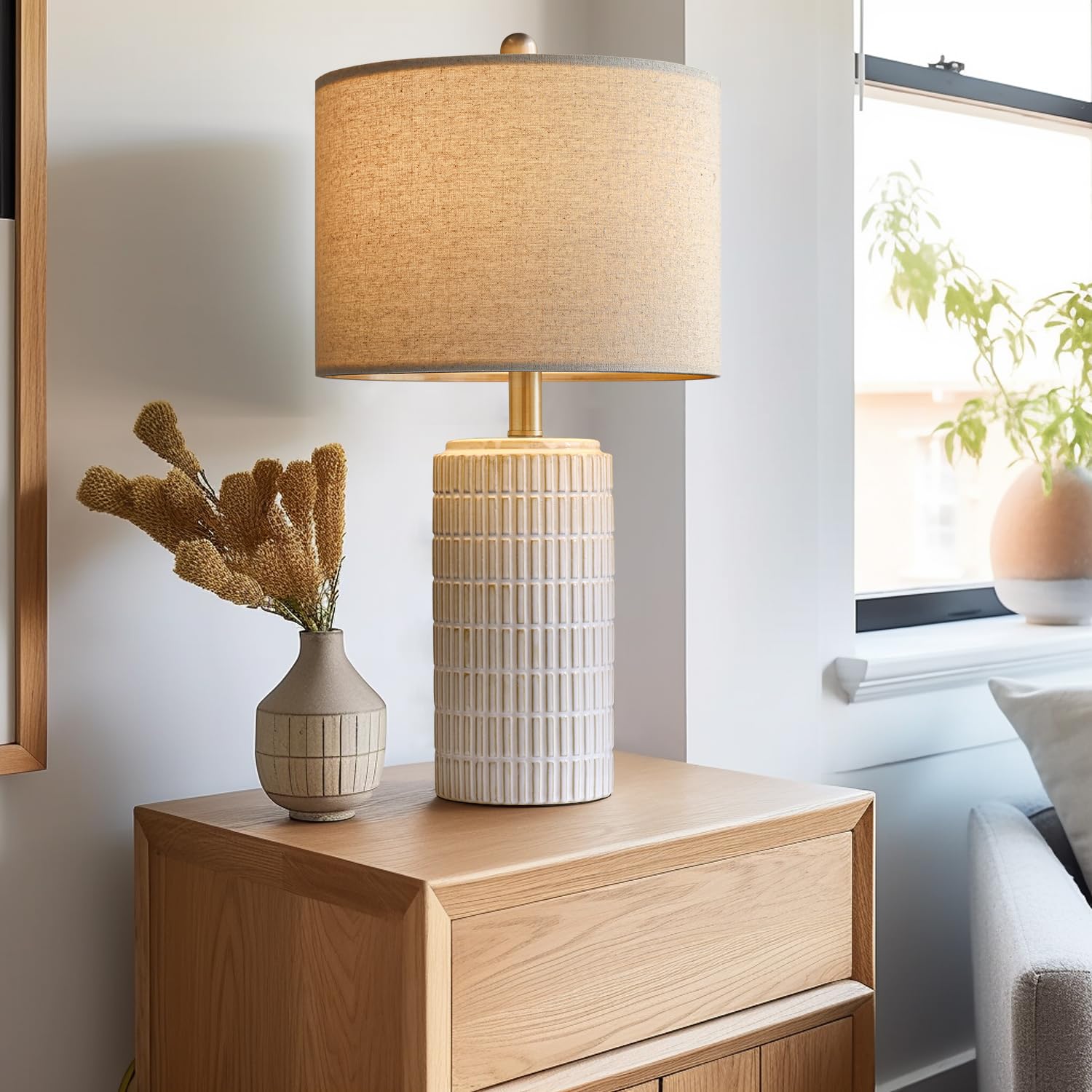Farmhouse-style PoKat lamps in beige finish complement rustic decor