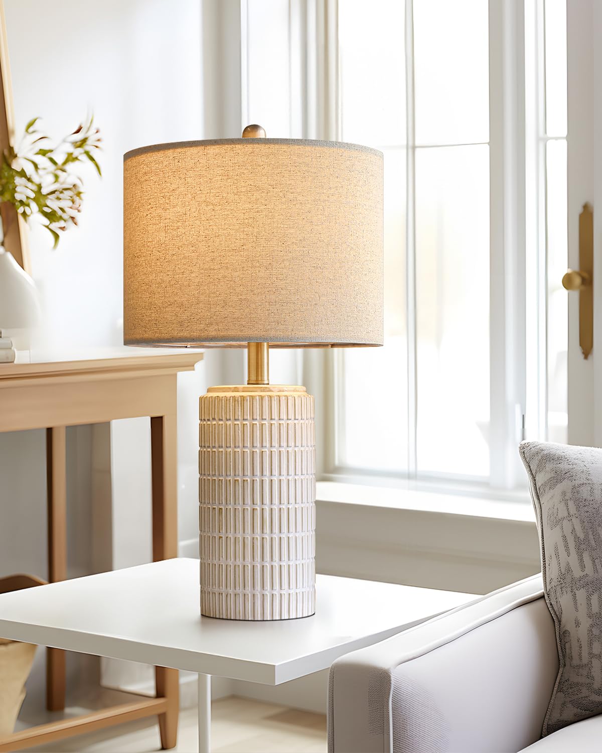 PoKat modern white lamp in-room setting for calm ambience.