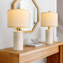 PoKat small ceramic table lamps pair on a bedside table for warm ambience