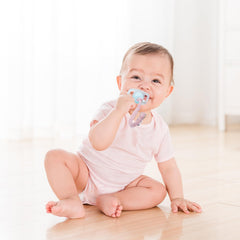 Pokipaw pacifier clip pastel purple braid keeps teether secured on clothing.