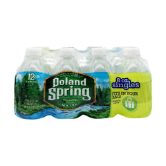 Poland Spring water label closeup highlighting source purity and quality.