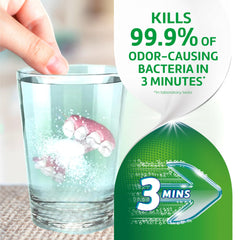 Polident tablets dissolving in warm water for fast disinfecting of dentures