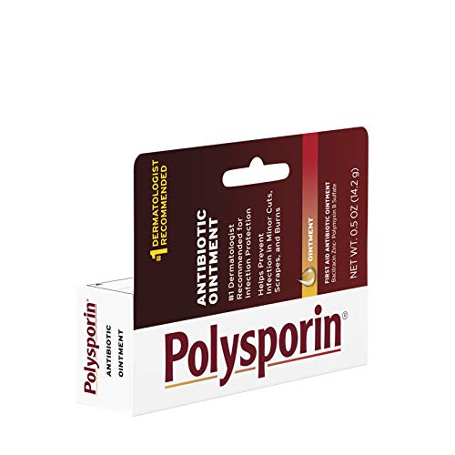 Close-up of Polysporin being spread over a small wound.
