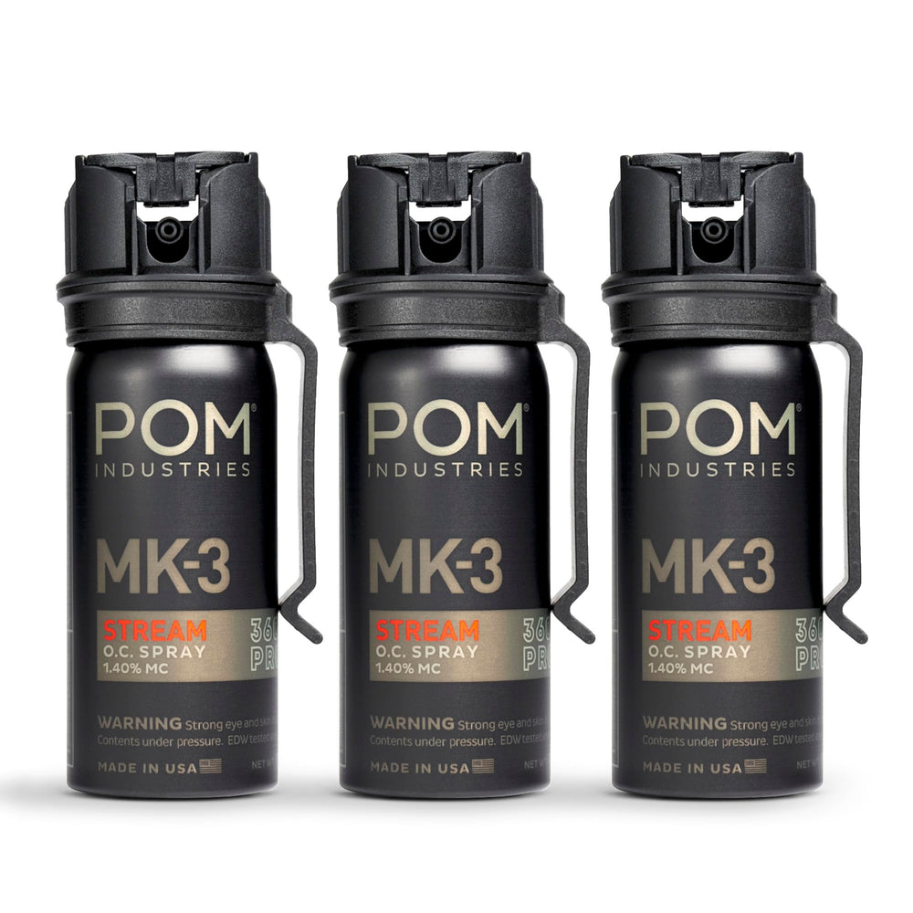 POM MK3 pepper spray with belt clip for fast access.