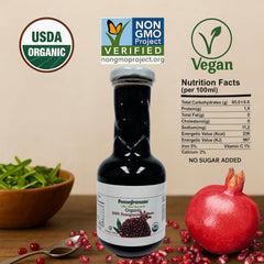 Pomegranaze 12oz glass bottle close-up highlights premium packaging and freshness.