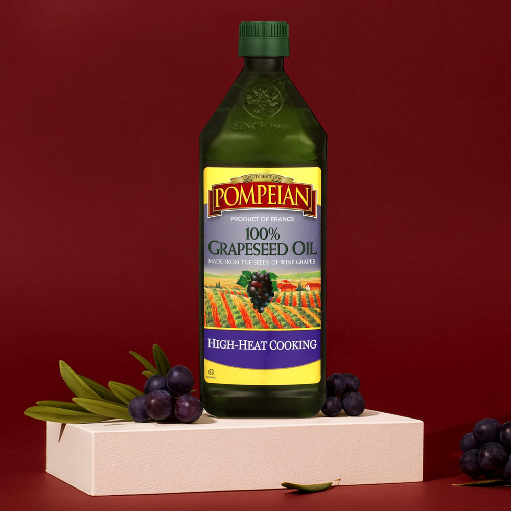 Glass bottle of Pompeian Grapeseed Oil in a bright kitchen.