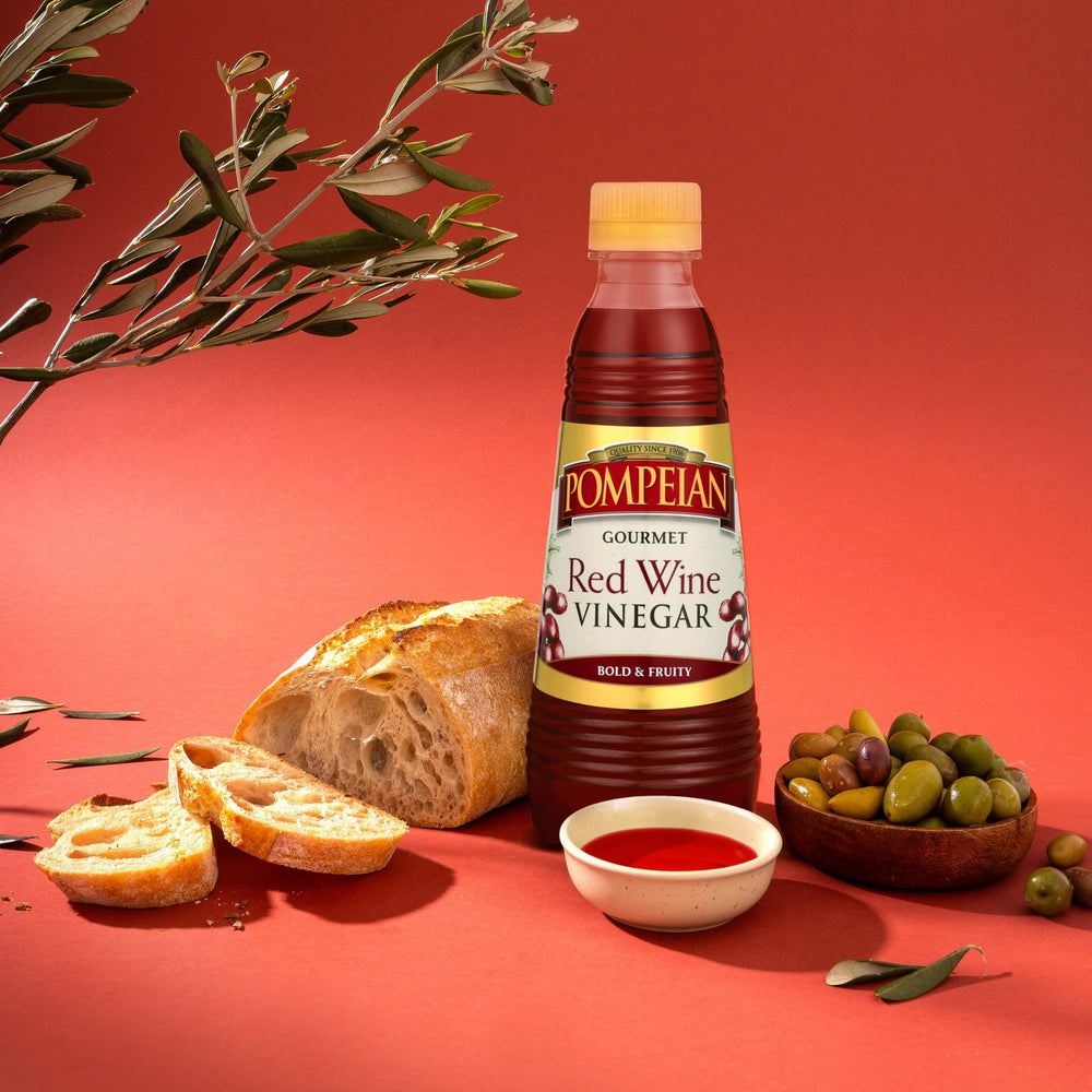 Pompeian Red Wine Vinegar container on pantry shelf.