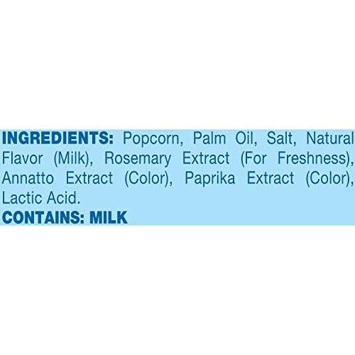 Kernels popping to light, fluffy texture in microwave.