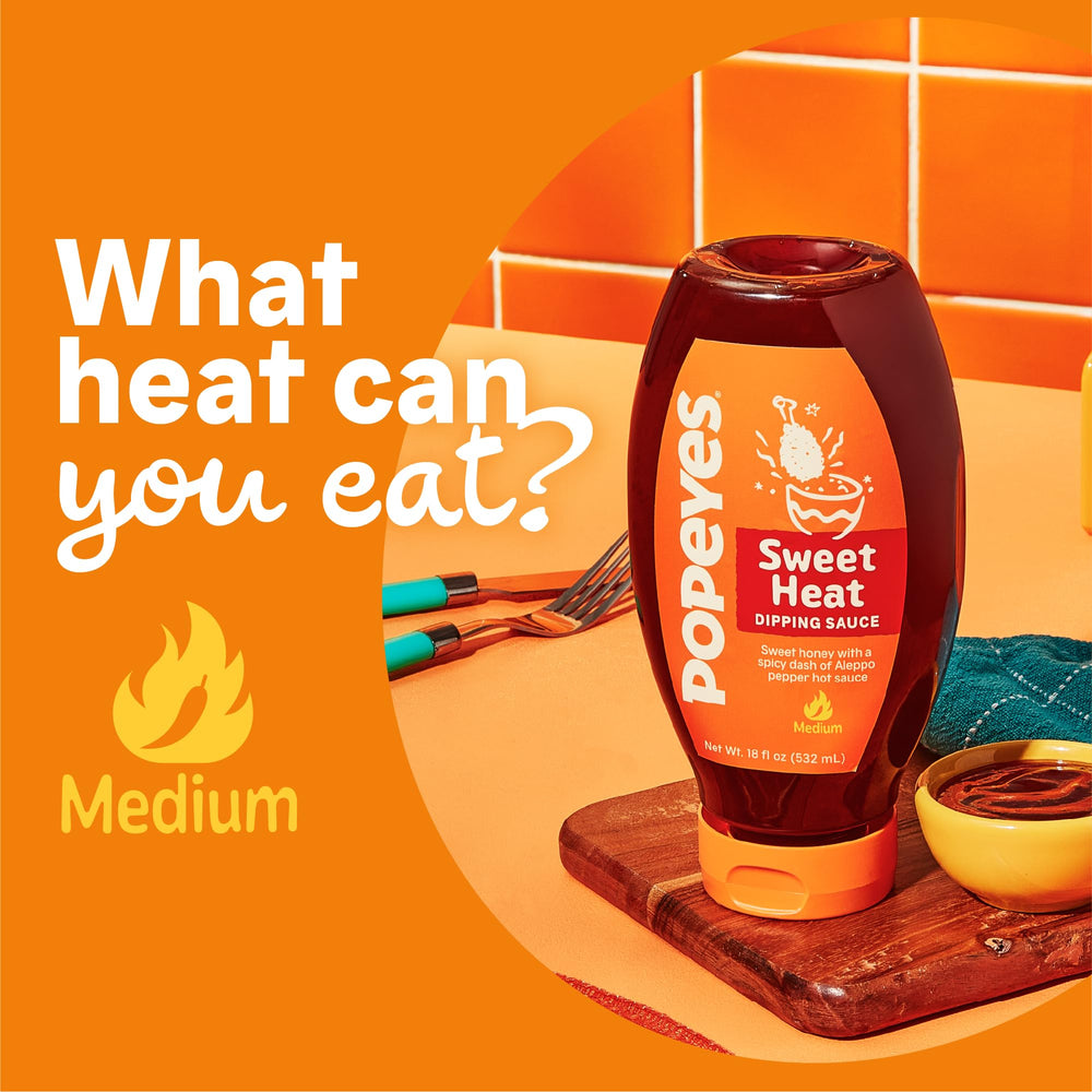 Popeyes Sweet Heat dipping sauce with shrimp and a glossy finish