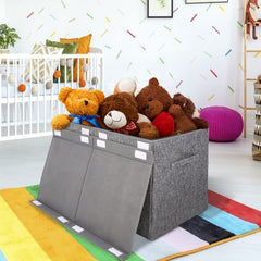 Popoly collapsible toy chest with riveted handles for easy transport.