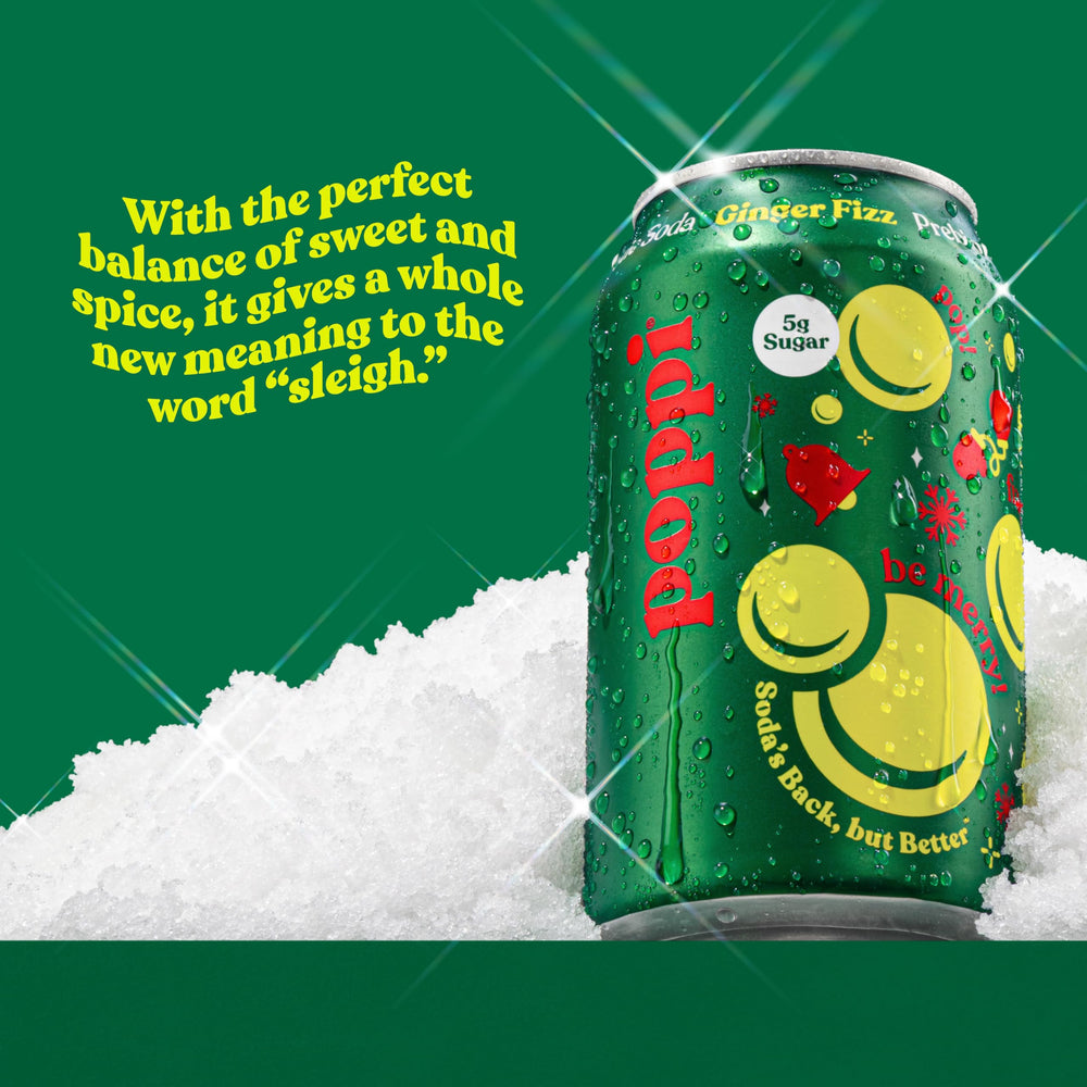Poppi Holiday Ginger Fizz glass pour shows sparkling amber soda, perfect as a mixer.