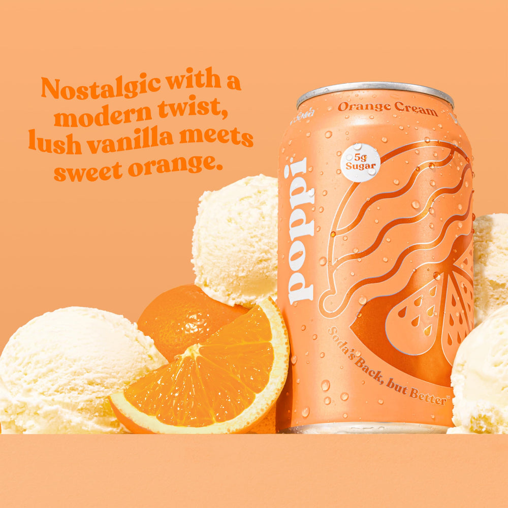 Poppi Orange Cream pour into glass showing fizz and creamy notes