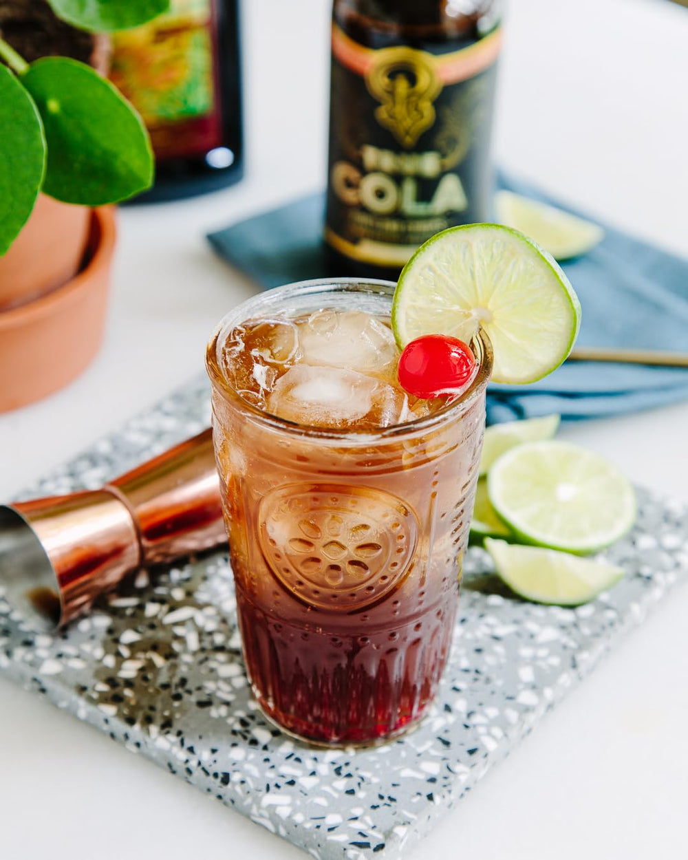 True Cola mixed with sparkling water for a refreshing mocktail