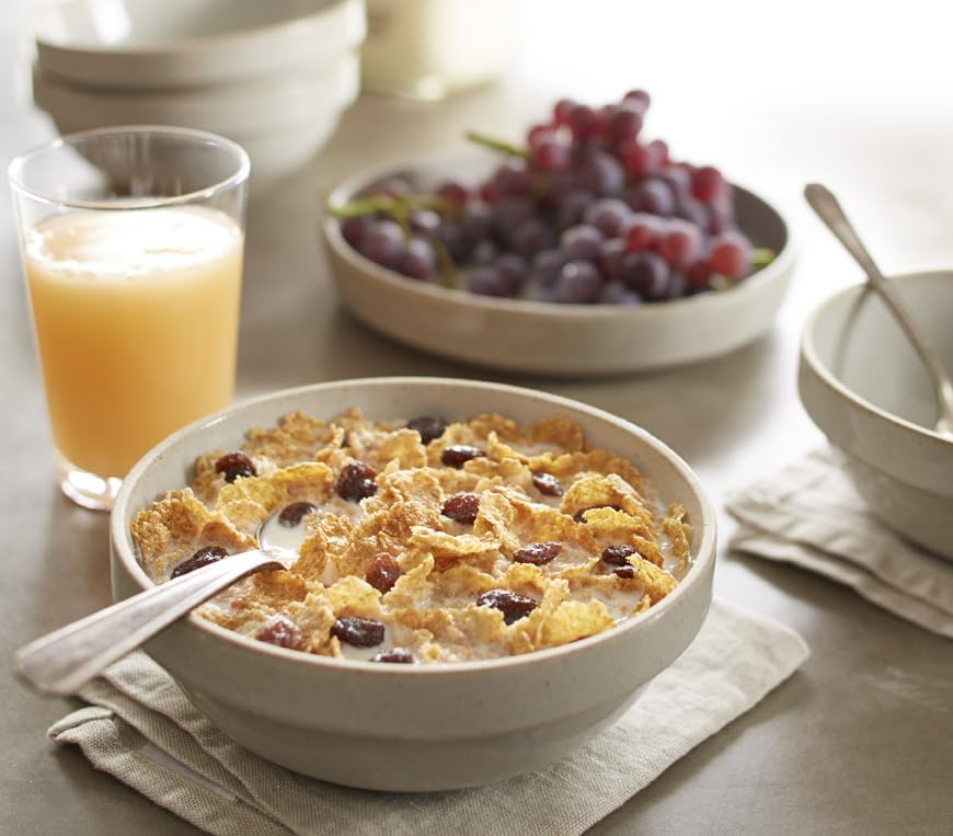 Sun-Maid raisins in Post Raisin Bran close-up, natural sweetness.