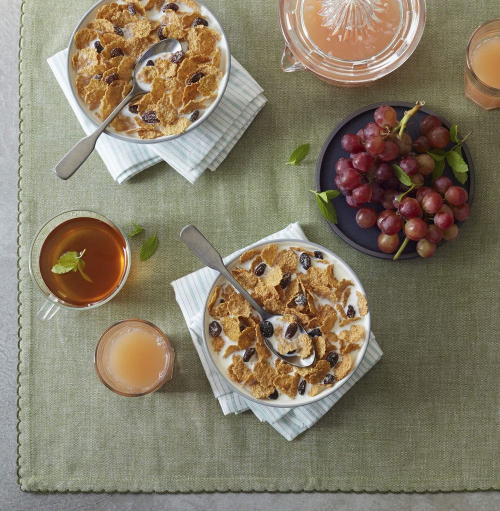 Milk poured over Post Raisin Bran for a quick breakfast.