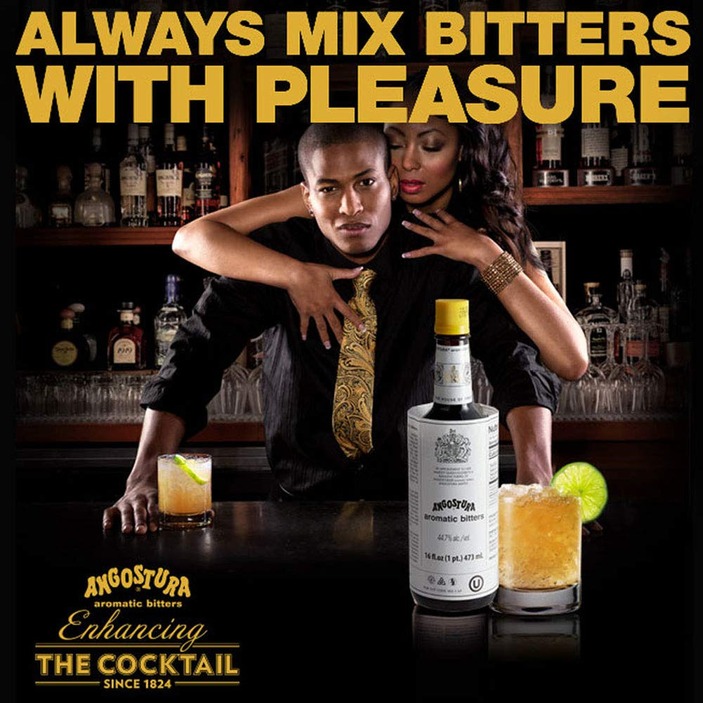 Pouring Angostura bitters over ice for a refined finish in drinks.