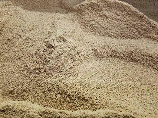 Poverty Bay White Coffee steaming cup highlights smooth, nutty cup with lower acidity.