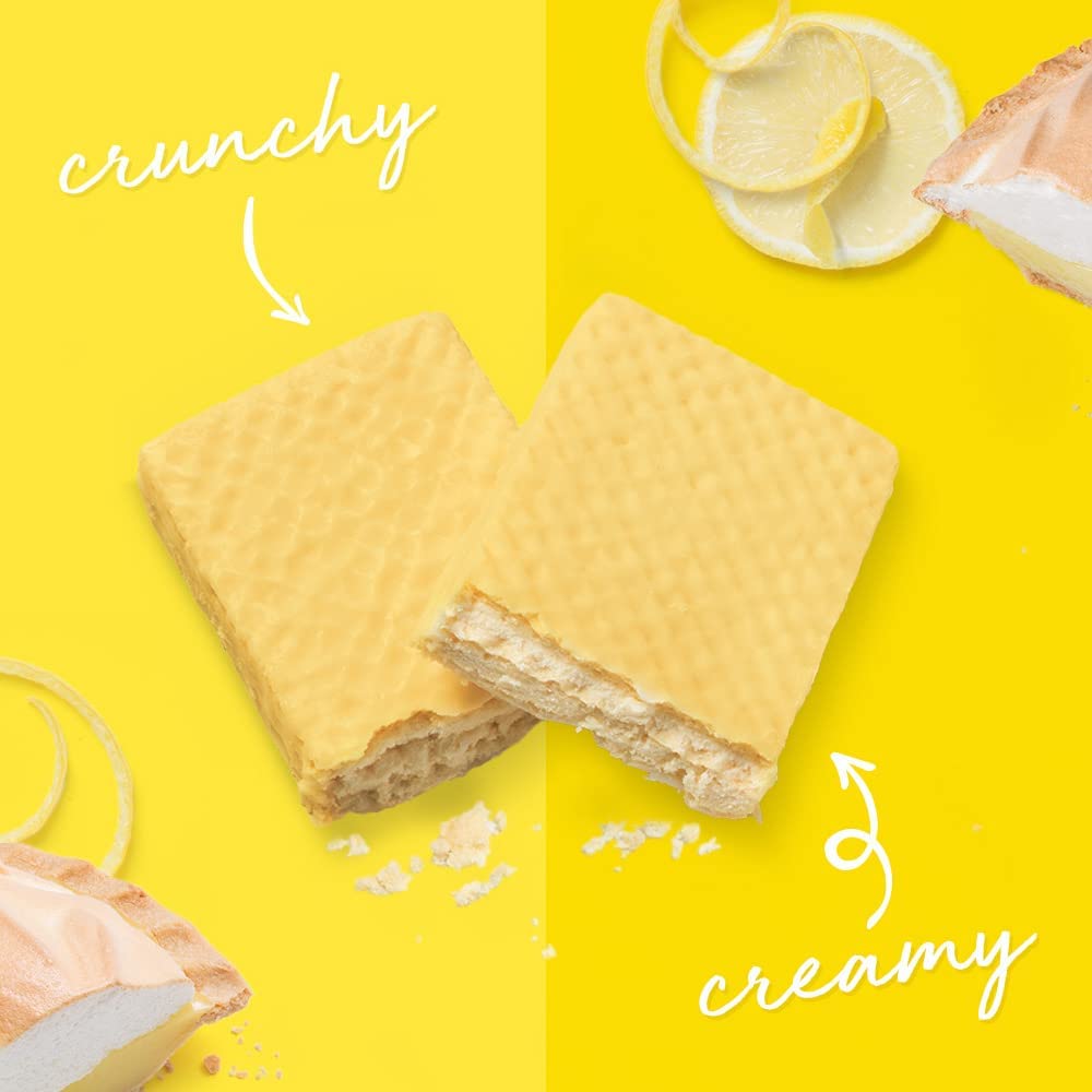 Power Crunch Lemon Meringue bar in hand, a convenient protein option.