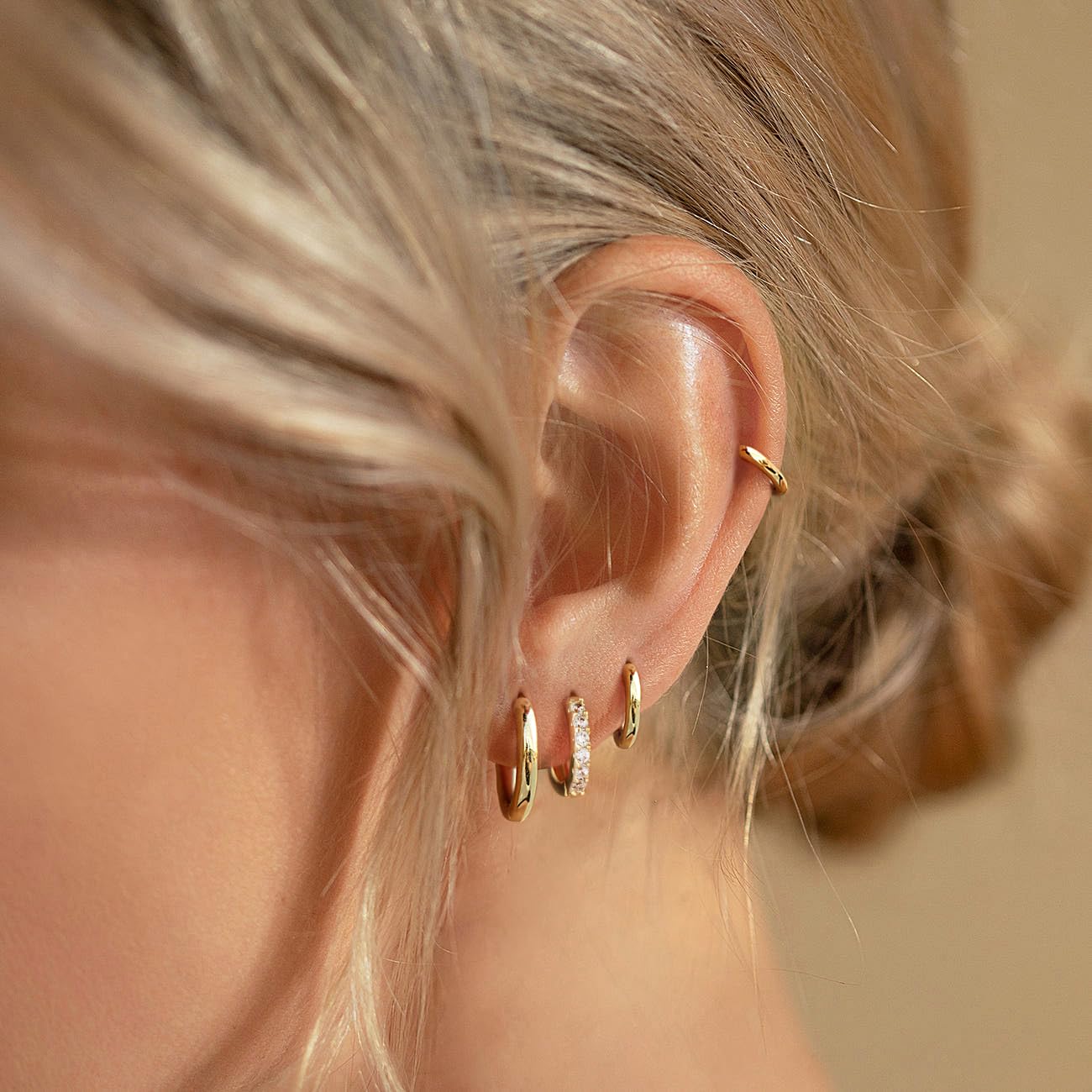 Poxtex Gold Hoop Earrings cartilage-helix style for versatile stacking.